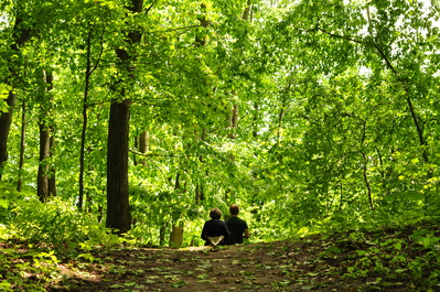 Mom and Anthony walking in the woods