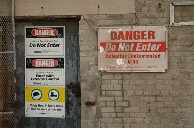 Warning signs against entering the Canada Malting Co. Apparently it's dangerous.