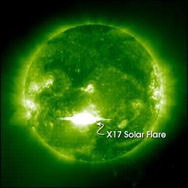 View from the Extreme Ultraviolet Imaging Telescope which shows light from a specific type of iron ion formed at 1.5 million degrees Kelvin. Taken at 11:12 UTC. Given the size of the sun, that white spot is pretty big. Image courtesy of the Solar & Heliospheric Observatory