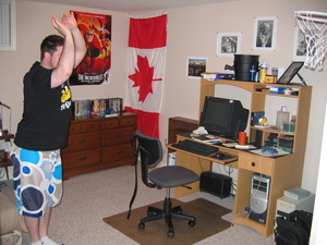Mike shooting a basket in front of my desk/dresser