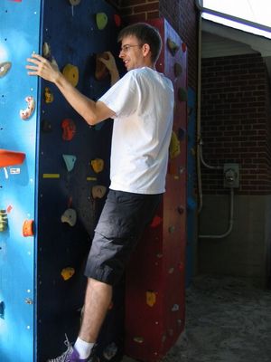Rock climbing -- cheating with my hand on the wall
