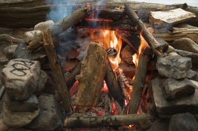 Our awesome fire, yes we wrote 'poo' in charcoal