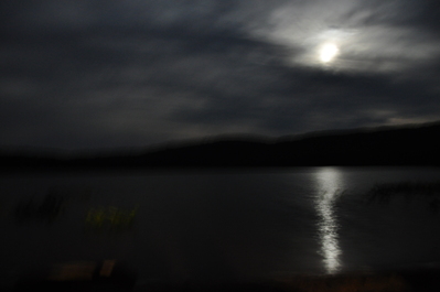 Jittery cool picture of moon and lake at night