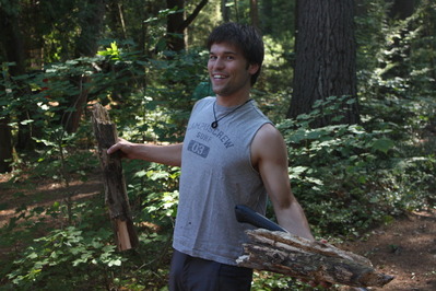 Kurtis posing with his wood and his axe