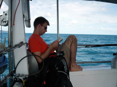 Me reading on the way out to the reef