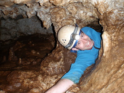 Squeezing through a hole in the caves