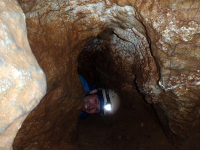 Tight, wriggly tunnel in the caves