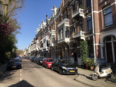 Residential street outside Vondelpark, the hooks are for hoisting furniture to upper levels because the stairs are too narrow
