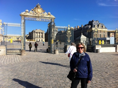 Mom at the gates to Versailles