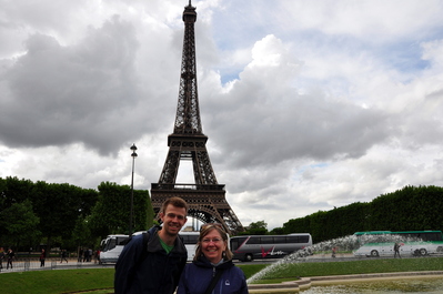 Mom and I with that big tower thing (Anthony is somewhere on it, climbing the stairs)