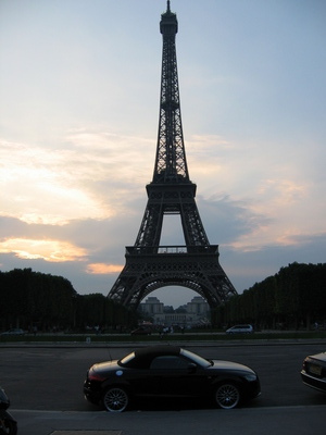 The sun setting behind the Eiffel Tower
