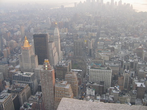 Picture from the Empire State Building looking south towards the financial district, skyline missing the World Trade Centre, Statue of Liberty barely visible in top right corner