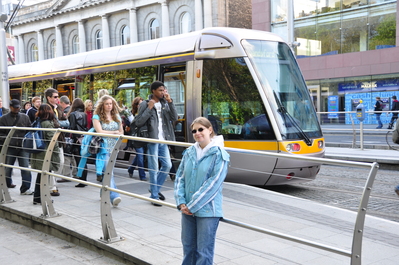 Kim with a 'Luas' train, one of the ones Toni helped get running when she working in Dublin