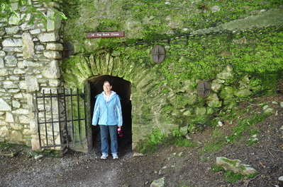 Kim at the entrance to the Rock Close at Blarney Castle, she fits in the door