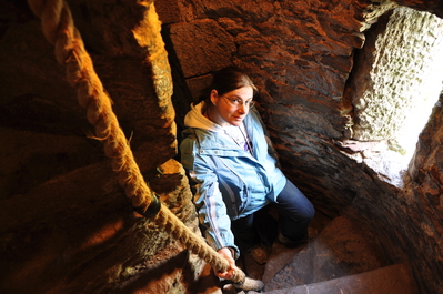 Kim climbing the spiral staircase at Blarney Castle