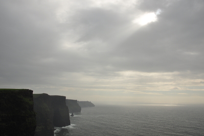 Cliffs of Moher with sun peeking out