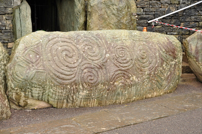 Decorated head stone at the entrance to Newgrange
