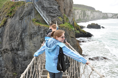 Kim crossing the rope bridge