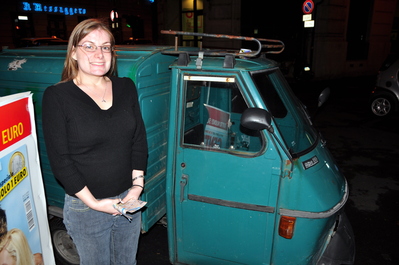 Kim with a wee little garbage truck
