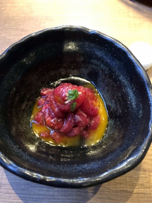 Beef tartare made with thinly sliced sirloin instead of ground beef