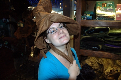 Kim trying on the sorting hat in FAO Schwartz
