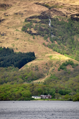 House and waterfall on Loch Lomond