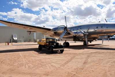 Old fueling truck with a plane Eisenhower flew on a bunch